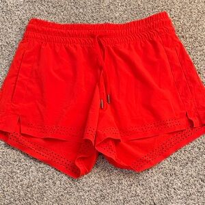 Athleta red orange shorts size 0